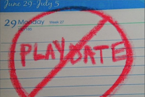 A close up of the word playdate written in red