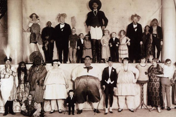 A group of people dressed up in costumes.